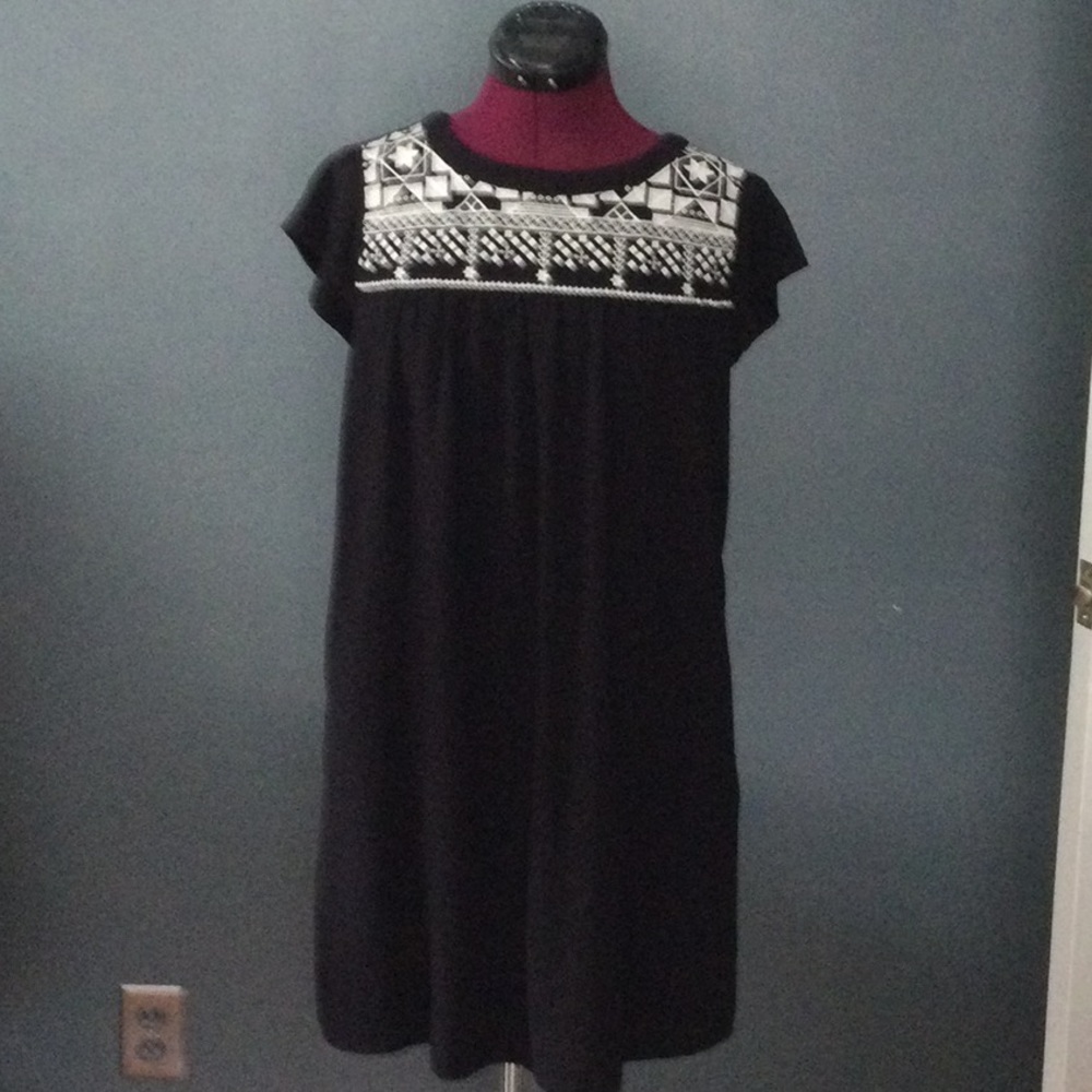 Woman’s black dress with embroidery